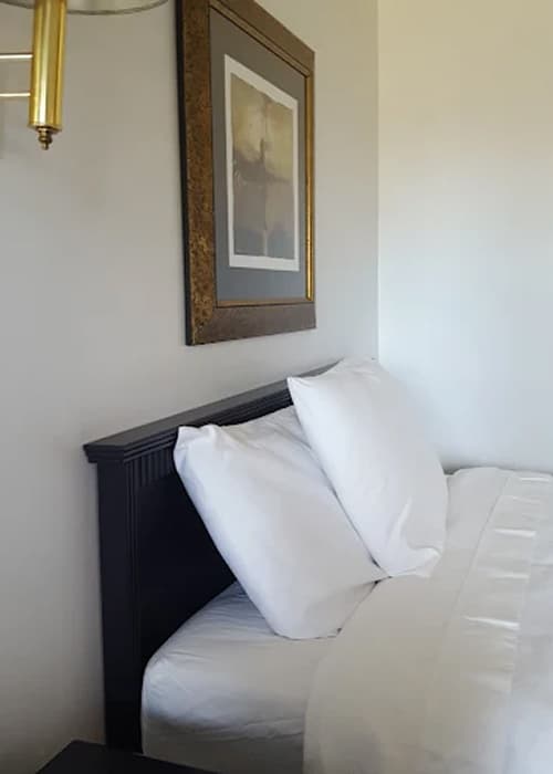 Modern bedroom with armchair